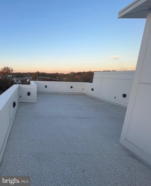 view of patio with a balcony