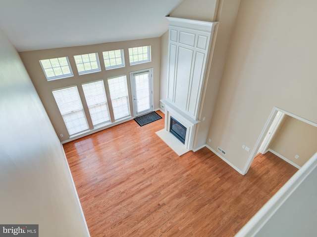 living room with light hardwood / wood-style flooring