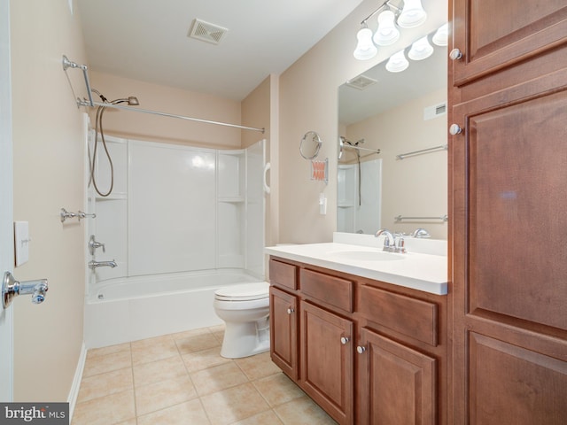 full bathroom featuring washtub / shower combination, tile patterned floors, vanity, and toilet