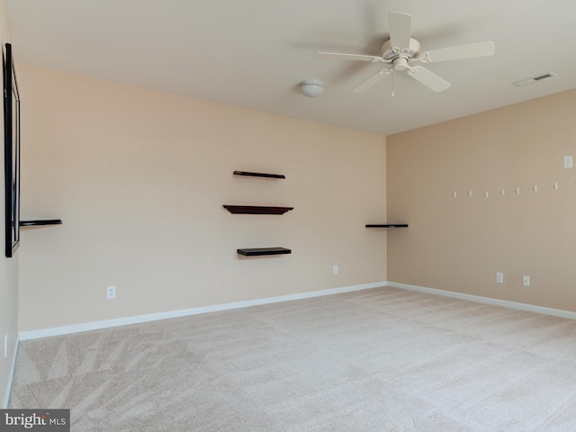 carpeted empty room with ceiling fan