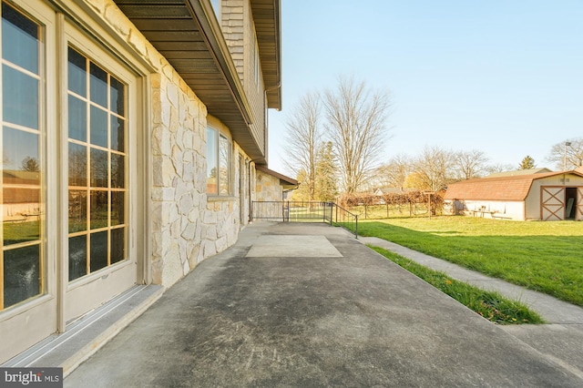 view of patio with a storage unit