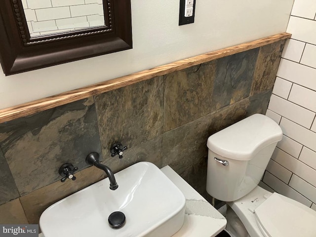 bathroom with toilet and sink