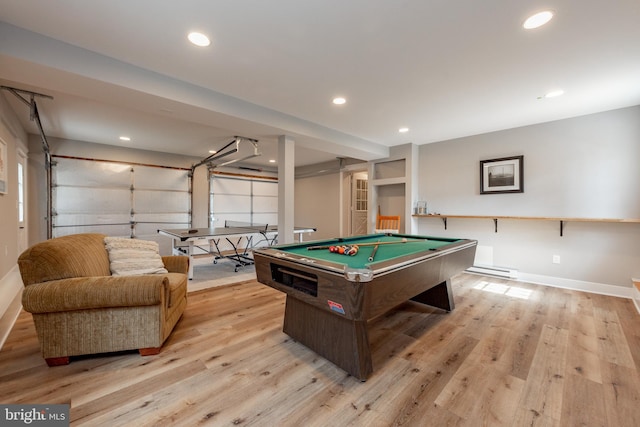 recreation room with baseboard heating, light hardwood / wood-style flooring, and billiards