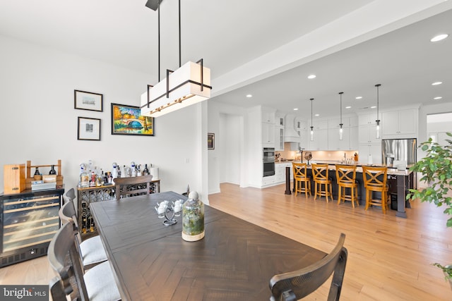 dining space featuring light hardwood / wood-style floors