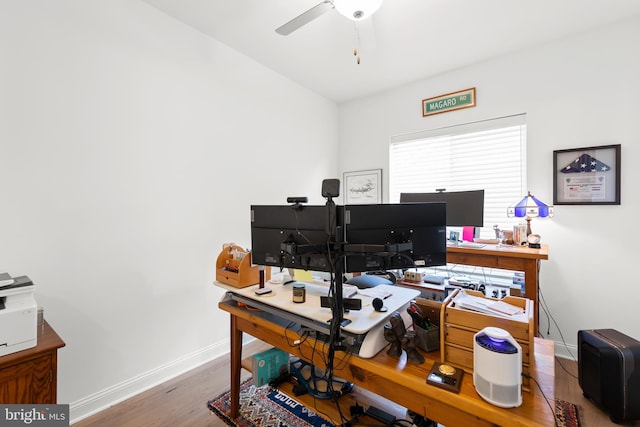 office space featuring wood-type flooring and ceiling fan