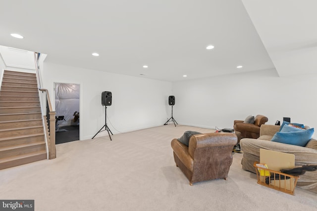 living room featuring light carpet