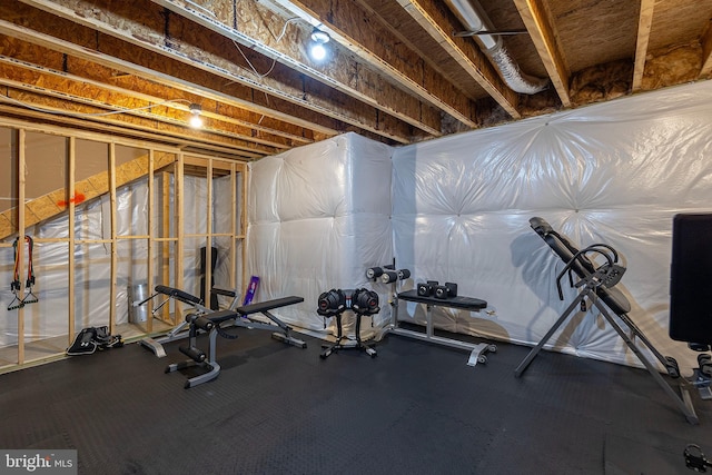 workout room featuring concrete flooring