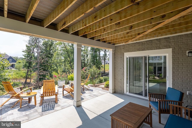 view of patio / terrace with a fire pit