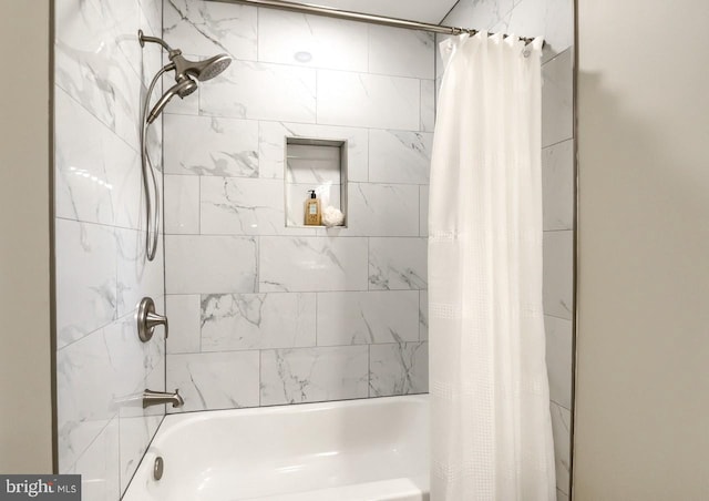 bathroom with shower / bath combo