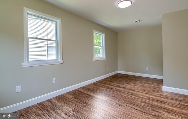 empty room featuring hardwood / wood-style floors