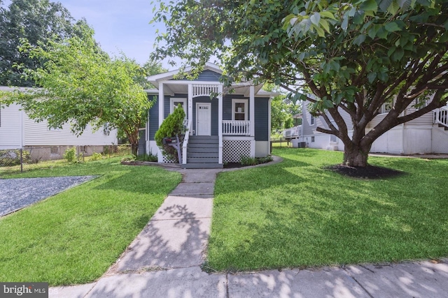 view of front of home with a front yard