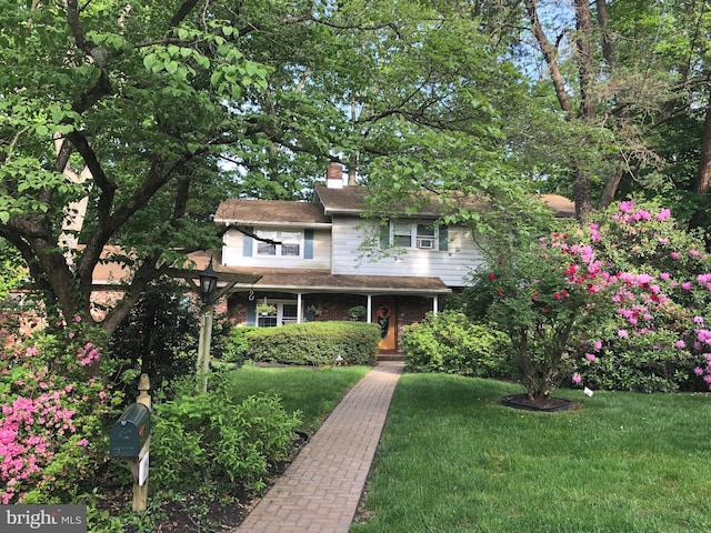 view of front of house with a front yard