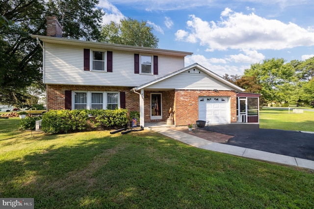 view of front facade featuring a garage and a front yard