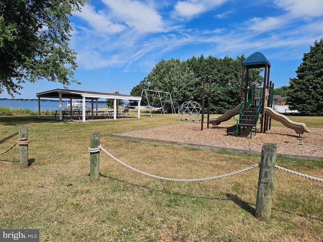 view of play area featuring a lawn