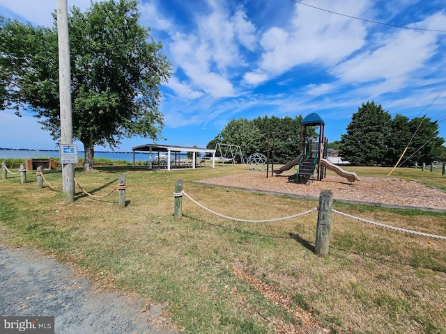 view of jungle gym featuring a yard