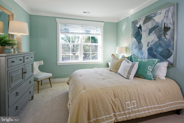 bedroom featuring light colored carpet and ornamental molding