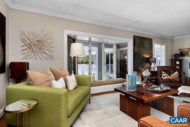 living room with light tile patterned flooring and crown molding