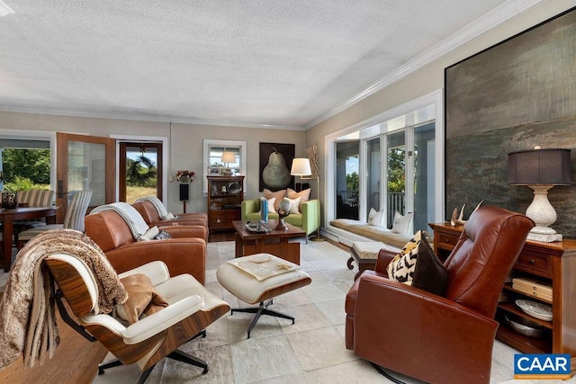 living room featuring light tile patterned floors, a textured ceiling, and crown molding