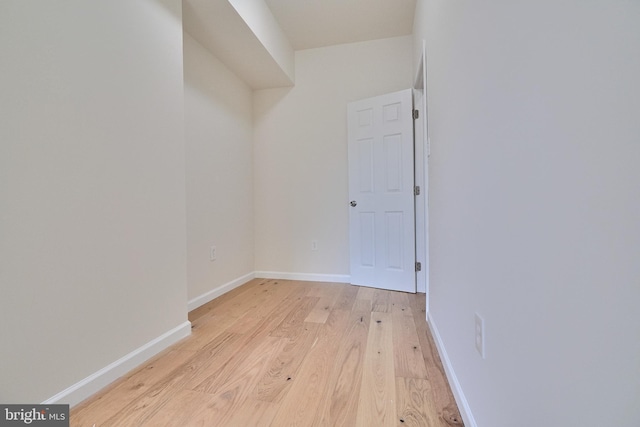 unfurnished room featuring light wood-type flooring