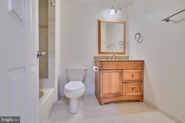 full bathroom featuring tiled shower / bath combo, tile patterned floors, toilet, and vanity