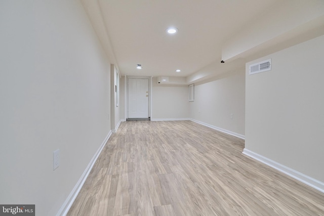 unfurnished room featuring light hardwood / wood-style flooring