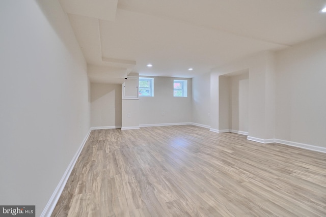 spare room featuring light wood-type flooring