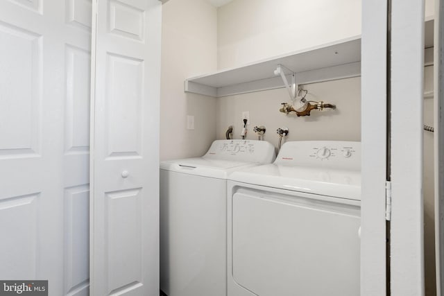 laundry area featuring washing machine and dryer