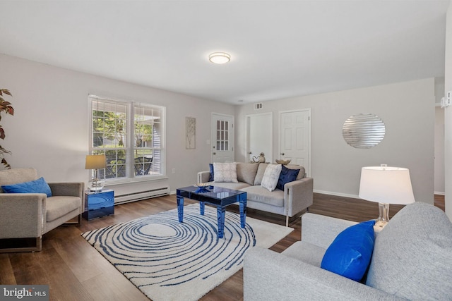 living room featuring hardwood / wood-style flooring and baseboard heating