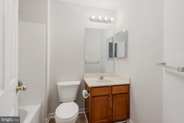 full bathroom featuring shower / bathing tub combination, toilet, and vanity