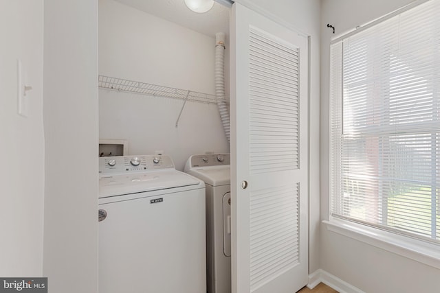 laundry room featuring independent washer and dryer