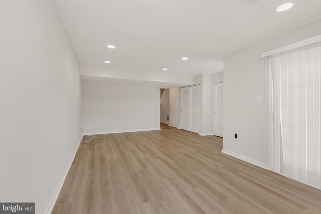 unfurnished room featuring light hardwood / wood-style flooring