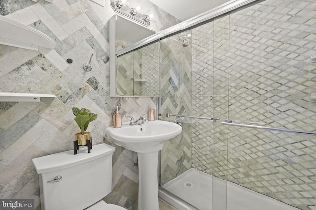 bathroom with toilet, tile walls, walk in shower, and tasteful backsplash