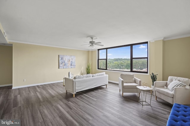 living room featuring ceiling fan, dark hardwood / wood-style floors, and ornamental molding