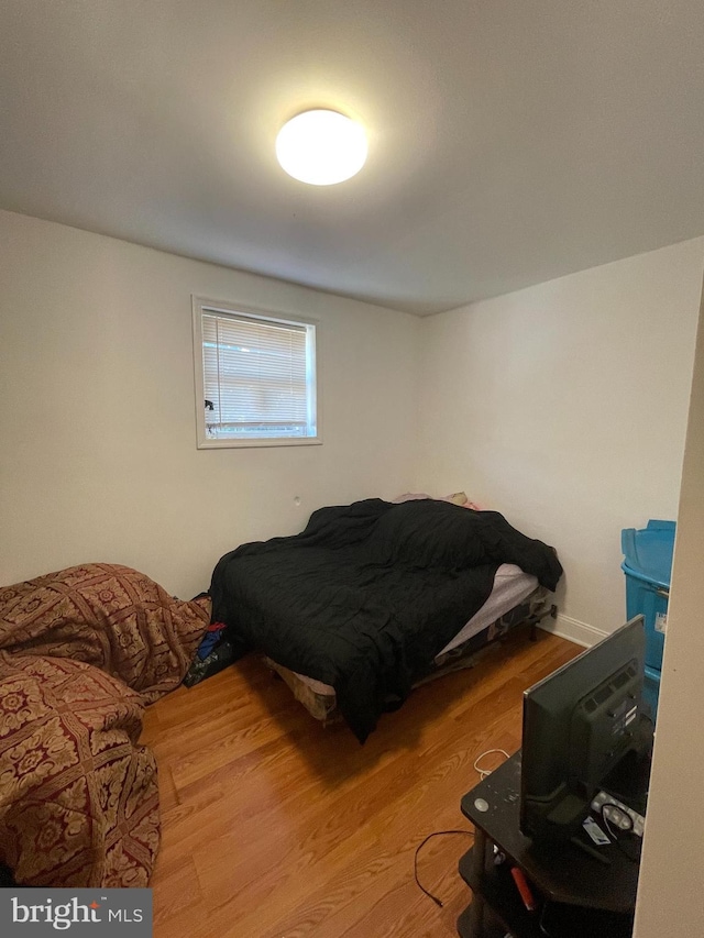 bedroom featuring hardwood / wood-style flooring