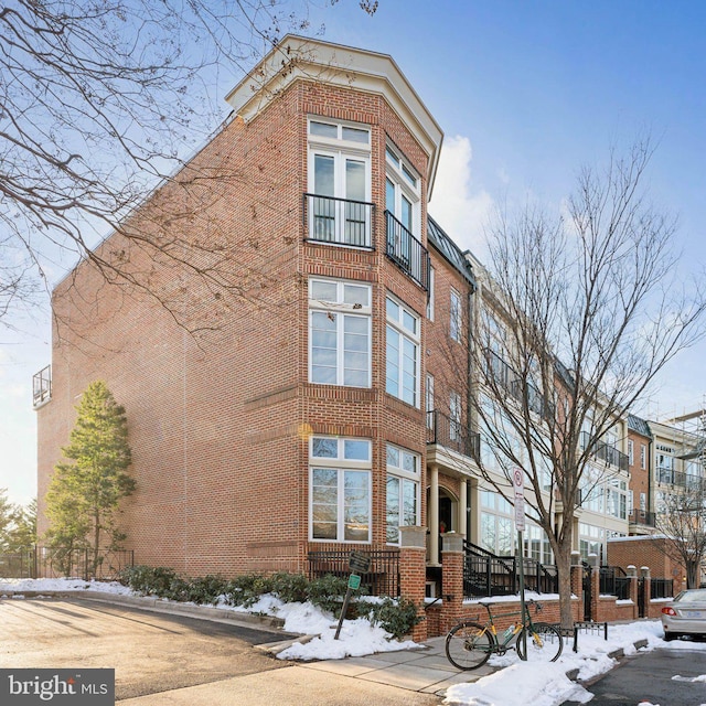 view of snow covered building