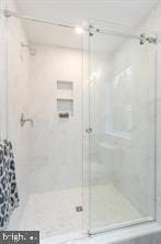 bathroom featuring walk in shower