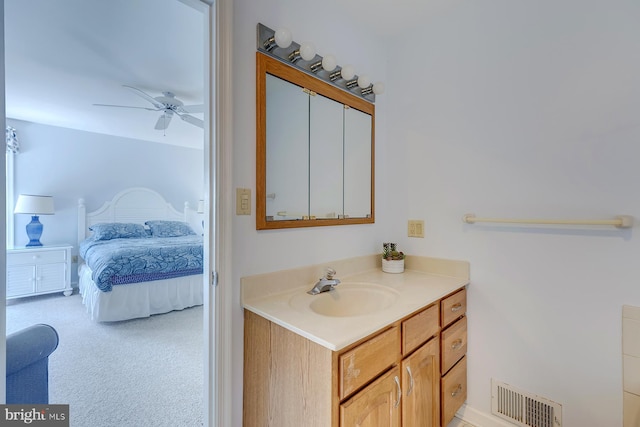 bathroom with vanity and ceiling fan