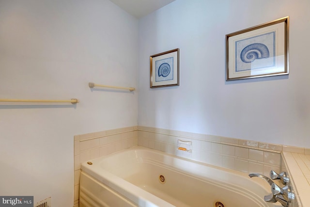 bathroom with a tub to relax in