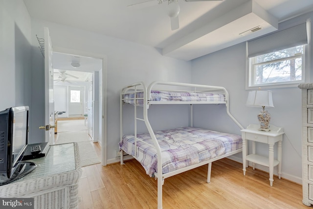 bedroom featuring ceiling fan and light wood-type flooring