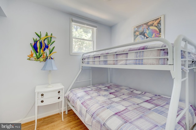 bedroom featuring wood-type flooring