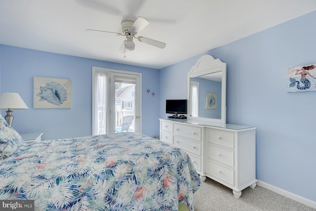 carpeted bedroom with access to outside and ceiling fan