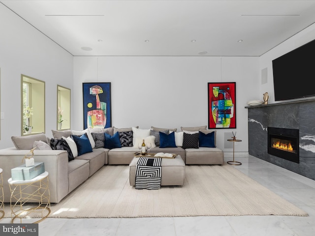 living room featuring a fireplace