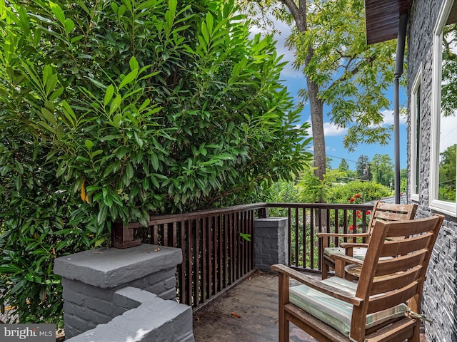 wooden balcony featuring a wooden deck