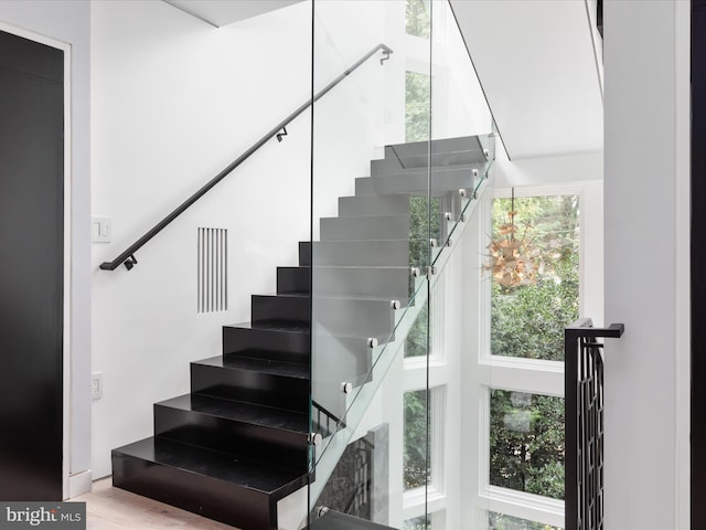 staircase with a healthy amount of sunlight