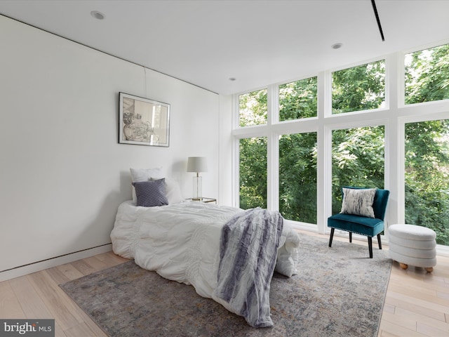 bedroom with light wood-type flooring