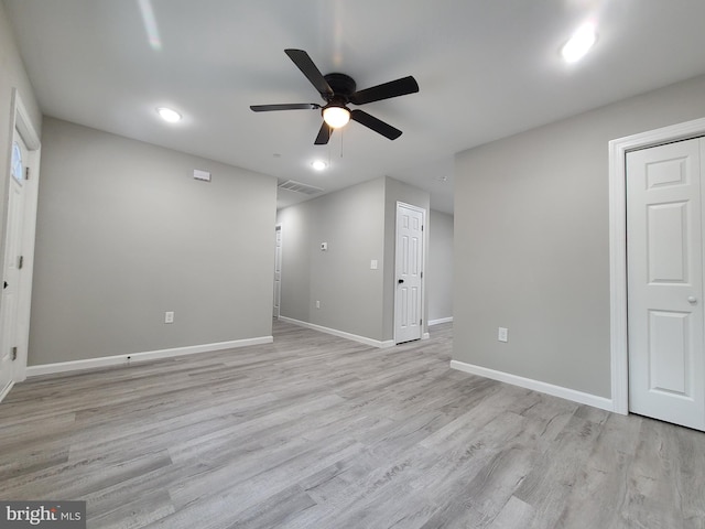 interior space with ceiling fan and light hardwood / wood-style flooring