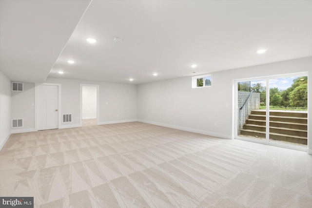 basement with light colored carpet