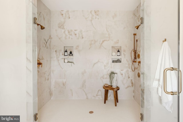 full bathroom featuring a stall shower