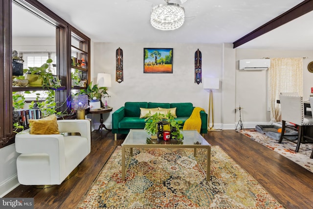 living room featuring dark wood-type flooring and a wall unit AC