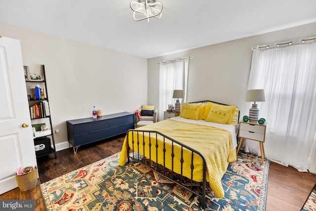 bedroom with wood-type flooring